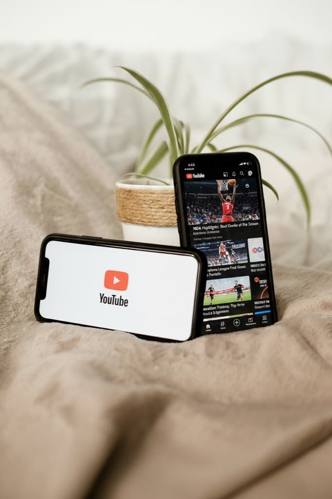 Phones displaying sports broadcasting and streaming content